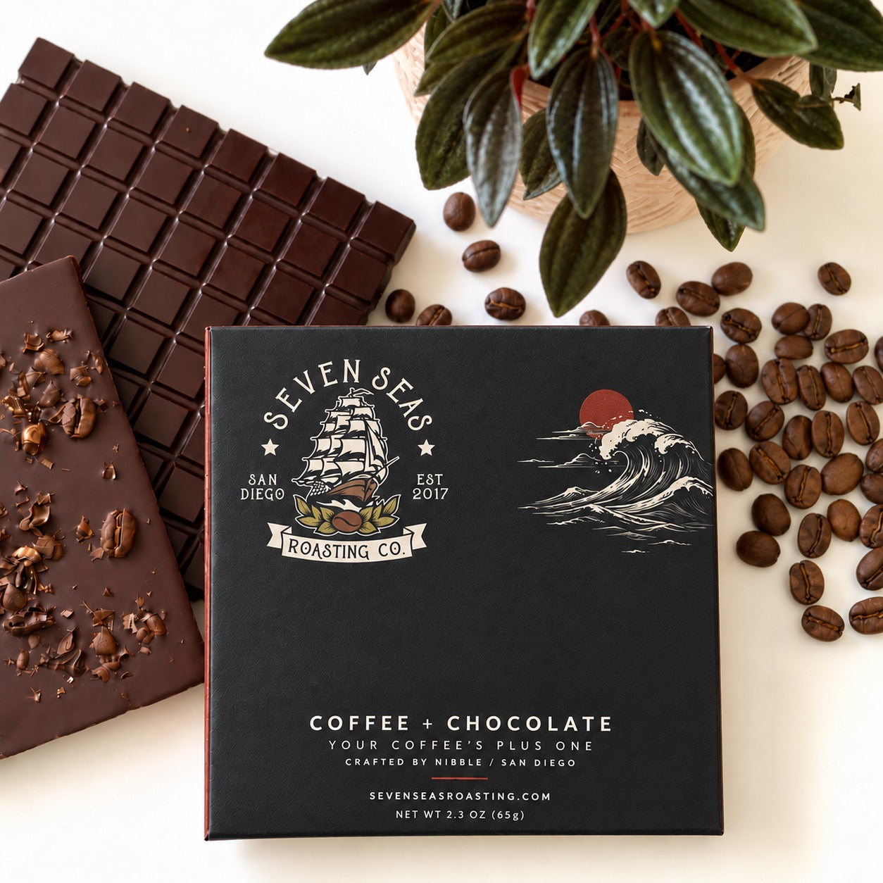 Custom coffee and chocolate packaging with chocolate bars and coffee beans